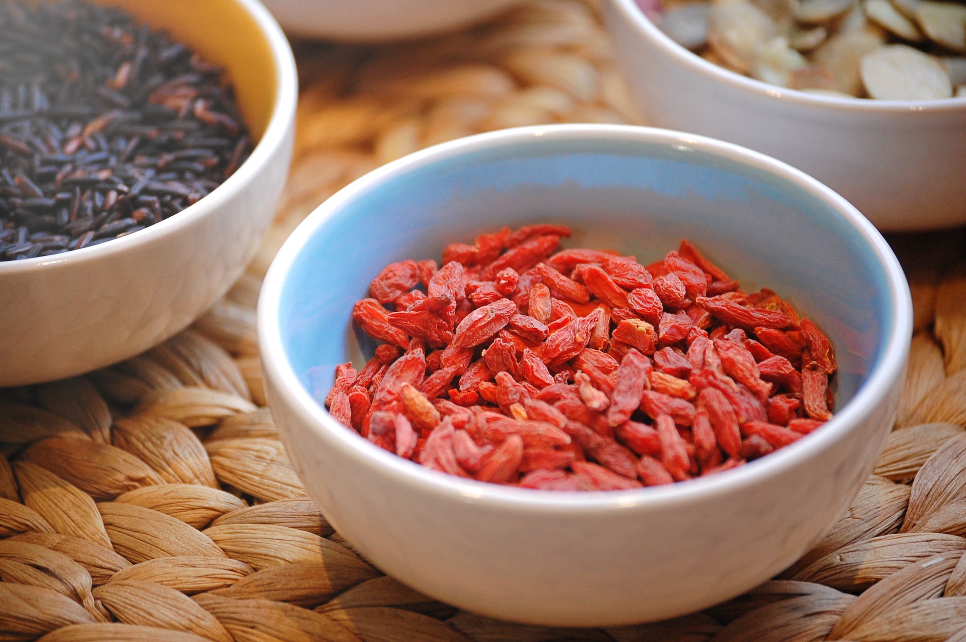 dried fruit goji berries in ceramic bowl