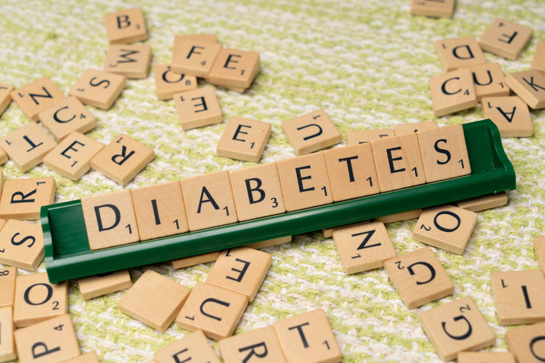 diabetes and the word diabetes on a green background