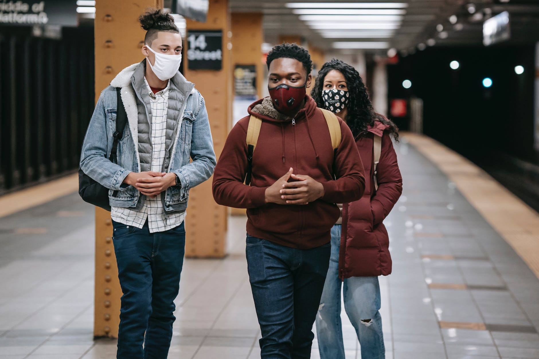 young multiethnic students in medical masks